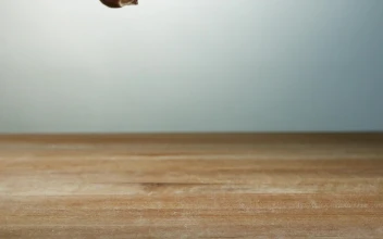Stock Video Garlic Pieces Falling To The Table In Slow Motion For PC