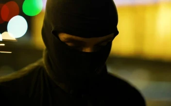 Stock Video Gangster With Face Cover Looking At The Camera For PC