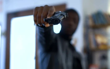 Stock Video Gangster Aiming With A Gun At The Camera For PC