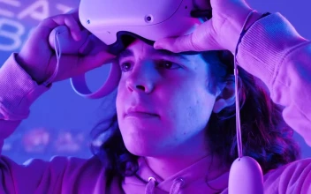Stock Video Gamer Man Puts On Vr Glasses For PC
