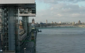 Stock Video Futuristic Design Buildings Along A River For PC