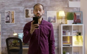 Stock Video Future Man Uses Mobile Voice Input To Turn Off Lights For PC