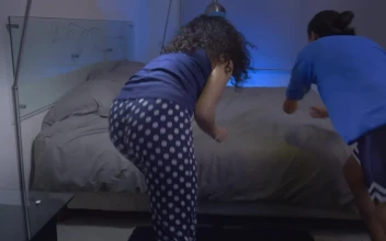 Stock Video Funny Couple Throwing Themselves On A Bed For PC