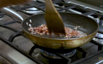 Stock Video Frying Diced Bacon In A Skillet For PC