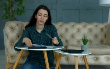 Stock Video Frustrated Woman Throws Paperwork On The Floor For PC