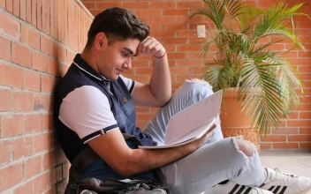 Stock Video Frustrated Student At His School Studying His Notes For PC