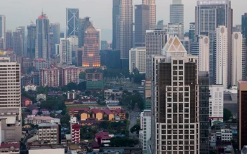 Stock Video From Day To Night In Kuala Lumpur Cityscape For PC