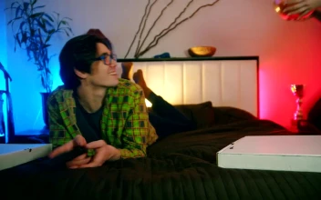 Stock Video Friends Watching Tv And Eating Snacks For PC