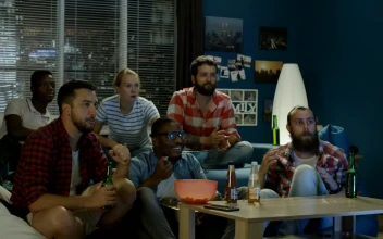 Stock Video Friends Watching To Be In The Living Room For PC