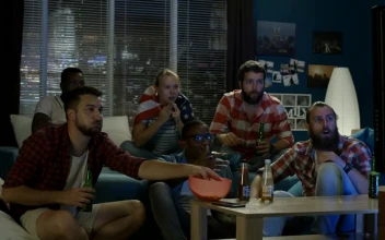 Stock Video Friends Watching A Sports Game At Home For PC