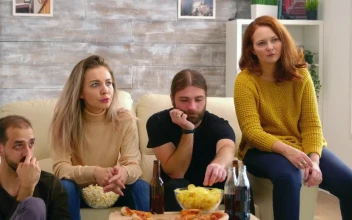Stock Video Friends Show Fear While Watching Movie On Sofa With Pizza For PC