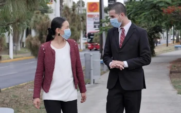 Stock Video Friends In Masks Talking And Walking On The Street For PC