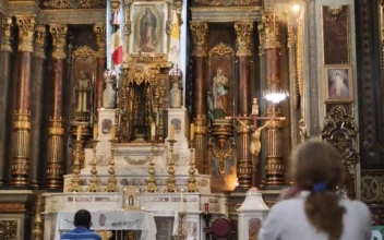 Stock Video Lady Praying In Front Of A Large Altar Inside A Smal Animated Wallpaper