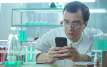Stock Video Laboratory Scientist Looking At The Phone Animated Wallpaper