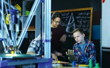 Stock Video Kids Try A Cardboard Robotic Arm Animated Wallpaper