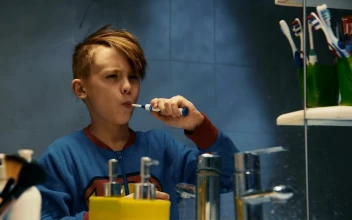 Stock Video Kid Brushing His Teeth In The Bathroom Animated Wallpaper