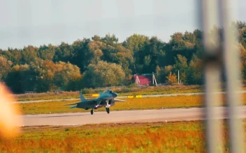 Stock Video Jet Moving In The Distance Down A Runway Animated Wallpaper