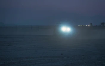 Stock Video Jeep With Headlights On In A Desert At Night Animated Wallpaper