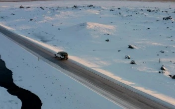 Stock Video Jeep Traveling A Road On A Road Surrounded By Snow Animated Wallpaper