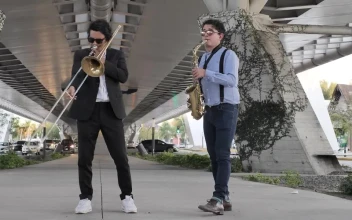 Stock Video Jazz Musicians Playing Alongside Traffic Animated Wallpaper