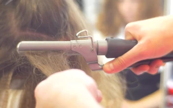 Stock Video Ironing A Womans Hair In The Salon Animated Wallpaper