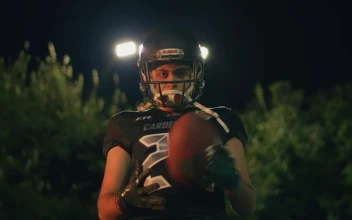 Stock Video Intimidating Football Player In Front Of The Camera Animated Wallpaper