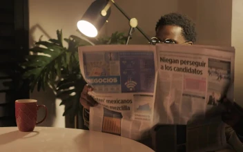 Stock Video Intellectual Man Reading The Newspaper With A Cup Of Coffee 4119 Animated Wallpaper