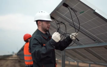 Stock Video Installing Solar Panels On A Cloudy Day Animated Wallpaper