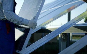 Stock Video Installing A Solar Panel Close Up Animated Wallpaper