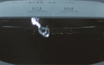 Stock Video Inside Of A Washing Machine While Filling With Water Animated Wallpaper