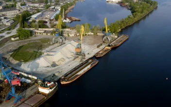 Stock Video Industrial Cranes And Cargo Ships By The River Animated Wallpaper