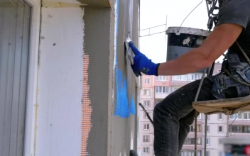 Stock Video Industrial Climbers Applying Cement To A Building Animated Wallpaper