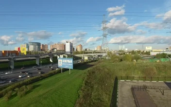 Stock Video Industrial City And Traffic Along A Busy Road Animated Wallpaper