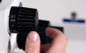 Stock Video Increasing The Zoom On A Microscope Animated Wallpaper