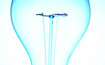 Stock Video Incandescent Light Bulb Turning On Animated Wallpaper