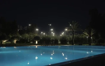 Stock Video Illuminated Hotel Pool At Night Animated Wallpaper