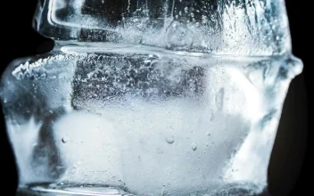 Stock Video Ice Cubes Thawing On Black Background Animated Wallpaper