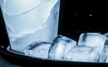 Stock Video Ice Cubes Melting On A Black Surface Animated Wallpaper