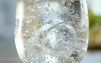Stock Video Ice Cube Drops Into Mineral Water Animated Wallpaper