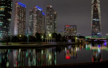 Stock Video Huge Skyscrapers Illuminated In Colors At Night Animated Wallpaper