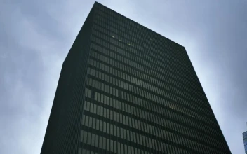Stock Video Huge Building Covered By Windows Shot From Below Animated Wallpaper