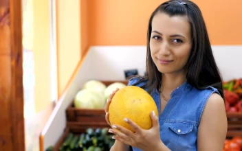 Stock Video Housewife Choosing Fruit At The Market Animated Wallpaper