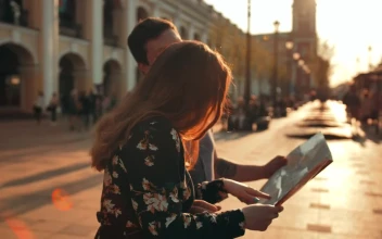 Stock Video Honeymoon Of A Couple Looking On A Map Animated Wallpaper