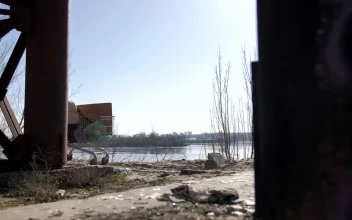 Stock Video Homeless Man With A Shopping Cart Under A Bridge Animated Wallpaper