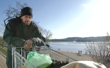 Stock Video Homeless Man With A Cart Of Plastic Bags Animated Wallpaper