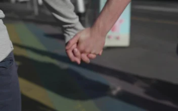 Stock Video Holding Hands Over Rainbow Crosswalk Animated Wallpaper