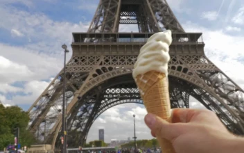 Stock Video Holding An Ice Cream By The Eiffel Tower Animated Wallpaper