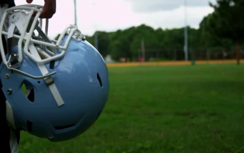 Stock Video Holding A Football Helmet At A Court Animated Wallpaper