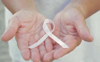 Stock Video Holding A Breast Cancer Ribbon In Her Hands Animated Wallpaper