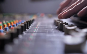 Stock Video Hiphop Producer Using A Mixing Console Animated Wallpaper